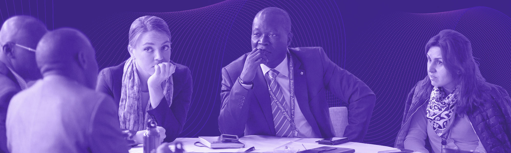 Attendees of the 2019 World Justice Forum with a purple overlay and purple background