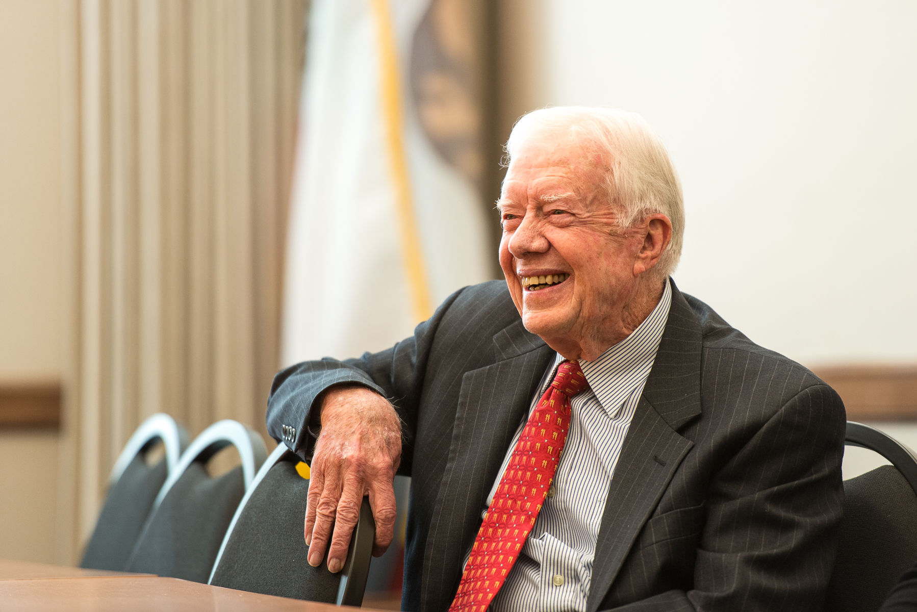 This image of President Jimmy Carter exudes warmth and humility, perfectly reflecting his lifelong commitment to service and justice.