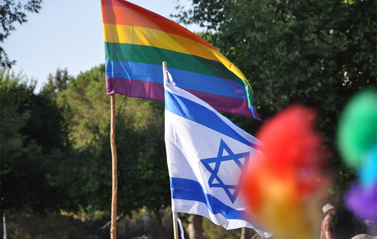 Pride and Israeli flags fly together at Jerusalem Pride 2012