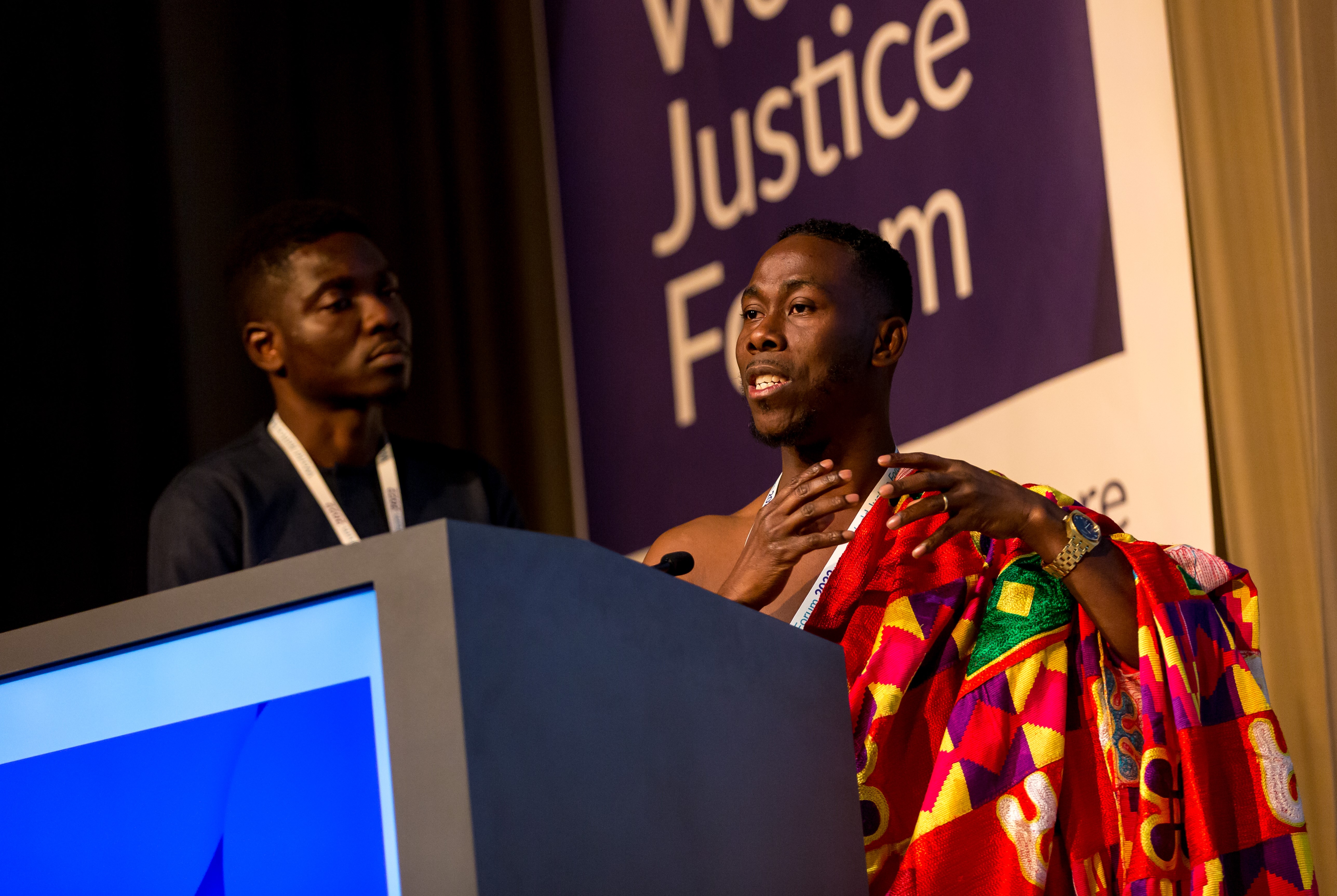  Jonathan Osei Owusu, the founder and executive director of the POS Foundation, presents during the 2022 World Justice Challenge showcase