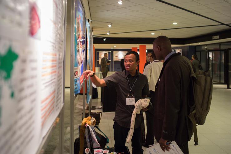 Forum attendees converse between sessions
