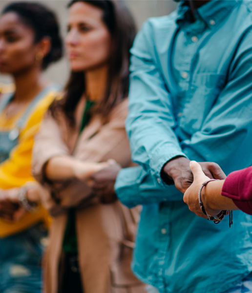 A group of people holding hands